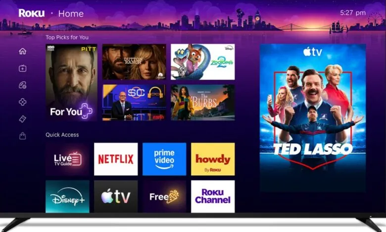 Roku TV home screen with streaming apps and 'Ted Lasso' featured.