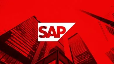 SAP logo over a red cityscape with tall buildings.