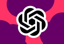 OpenAI logo in black and white on a pink and purple background.