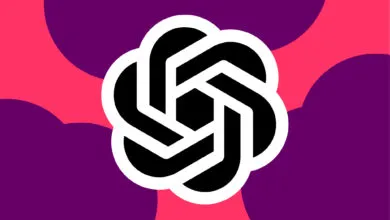 OpenAI logo in black and white on a pink and purple background.