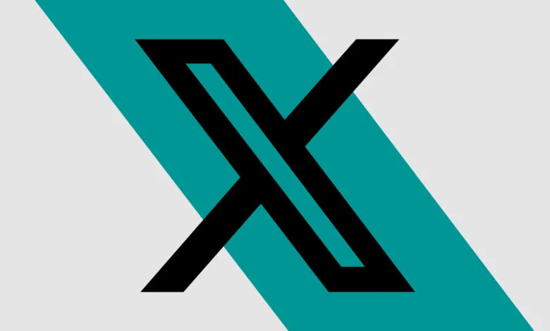 Stylized letter X logo in black on teal and gray background.