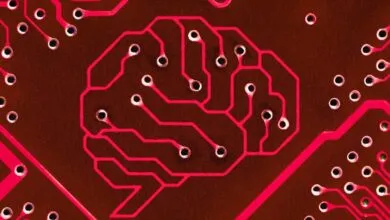 Circuit board with brain-shaped wiring, symbolizing artificial intelligence.