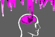 Pixelated head silhouette with pink paint dripping onto the brain area.