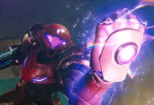 Samus Aran in her power suit, arm extended with glowing energy.