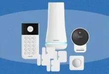 SimpliSafe home security system components on blue background.