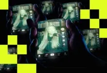 Multiple hands holding phones displaying a woman on TikTok.
