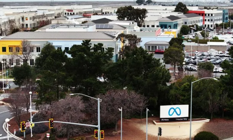 Meta headquarters complex with colorful buildings and full parking lot.