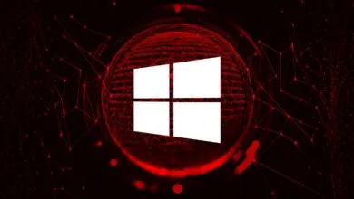 White Windows logo on a red digital network background.