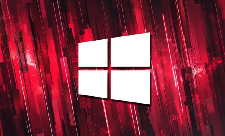 Windows logo on a red abstract background with geometric shapes and lines.