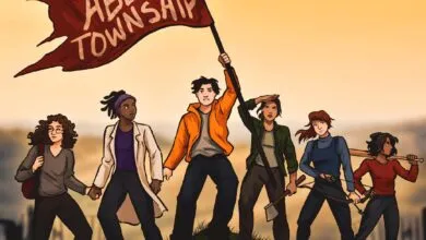 Group of diverse people holding 'Abel Township' flag, standing together.