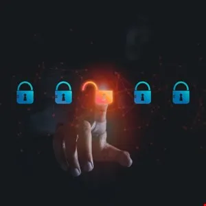 Hand touches glowing open padlock icon among closed padlocks, symbolizing cybersecurity.