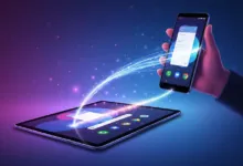 Smartphone and tablet connected by glowing data stream.