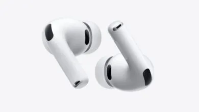 Two white Apple AirPods Pro earbuds isolated on a white background.
