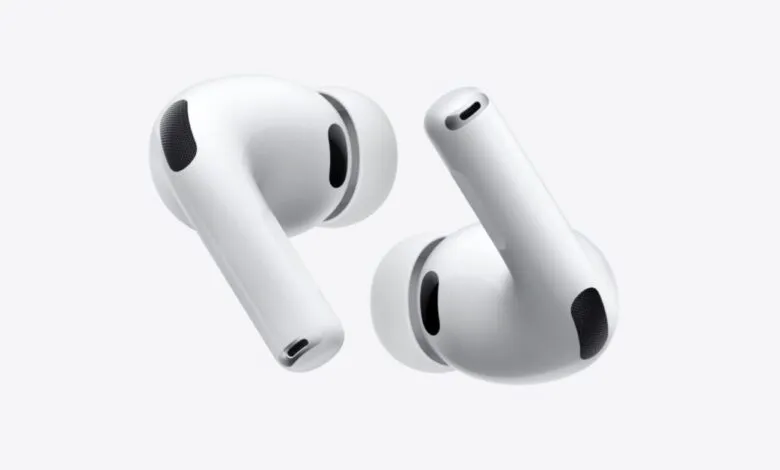 Two white Apple AirPods Pro earbuds isolated on a white background.