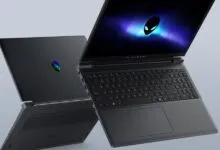 Two Alienware laptops, one open with logo on screen, one closed.