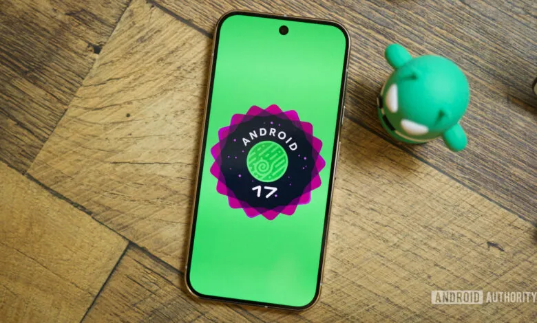 Android 17 logo on a phone screen with Android mascot.