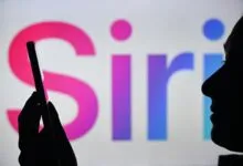 Silhouette of person using phone with 'Siri' logo in background.