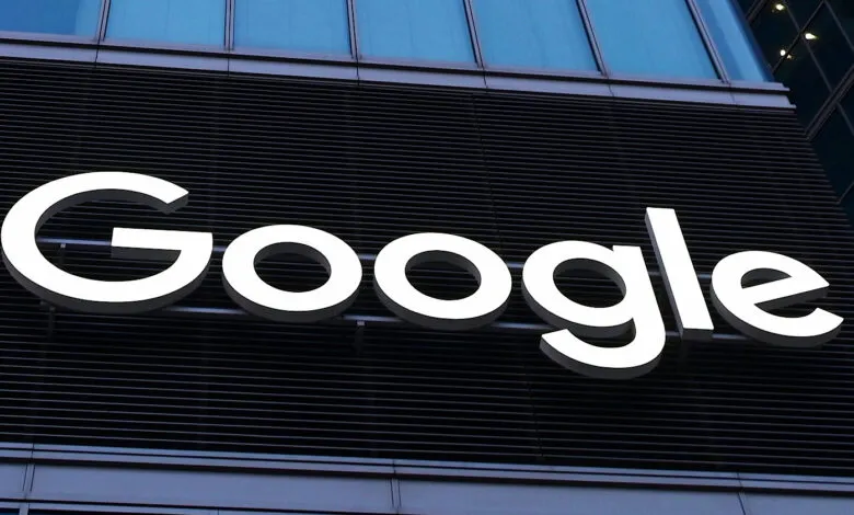 Google logo on the exterior of a modern office building.
