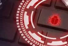 Keyboard key with a red bug icon, representing a computer virus or malware.