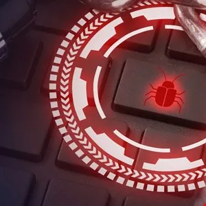 Keyboard key with a red bug icon, representing a computer virus or malware.