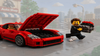 Lego man runs with car engine, red Lego car with open hood in background.