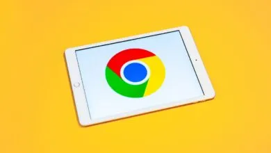 Tablet displaying the Google Chrome logo on a bright yellow background.