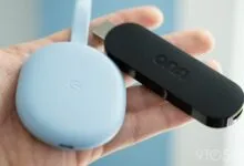 Onn 4K streaming stick and Google TV device in hand.