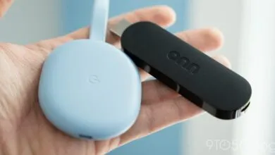 Onn 4K streaming stick and Google TV device in hand.