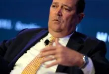 Chuck Robbins, CEO of Cisco, speaking at a conference.