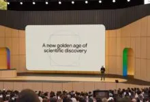 Demis Hassabis presents 'A new golden age of scientific discovery' on stage.