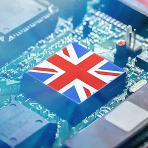 Close-up of a computer chip with the Union Jack flag on top.