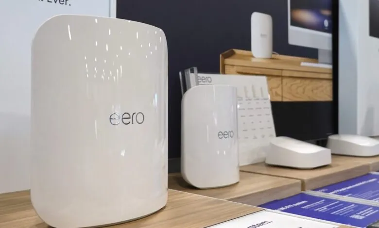 Eero WiFi routers displayed on a shelf, showcasing the product design.