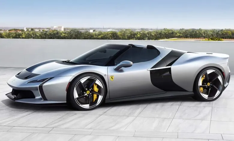 Sleek silver Ferrari HC25 roadster with black accents and yellow brake calipers.