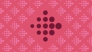 Fitbit logo pattern in shades of pink and maroon.