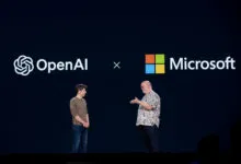 Sam Altman and Kevin Scott on stage at Microsoft Build event.