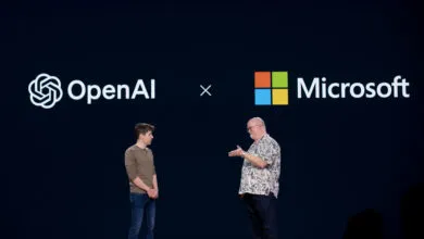 Sam Altman and Kevin Scott on stage at Microsoft Build event.