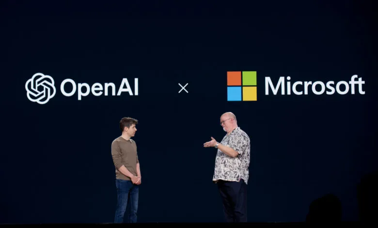 Sam Altman and Kevin Scott on stage at Microsoft Build event.