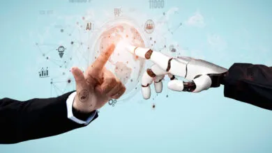 Human and robot hands touch over a digital globe with AI icons.