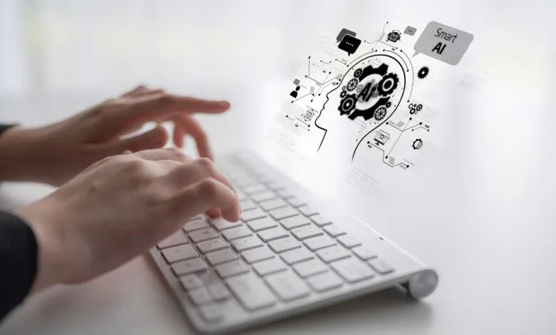 Hands typing on keyboard with AI brain graphic overlay.