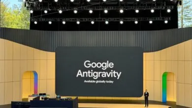 Google Antigravity announcement on stage with speaker and audience.
