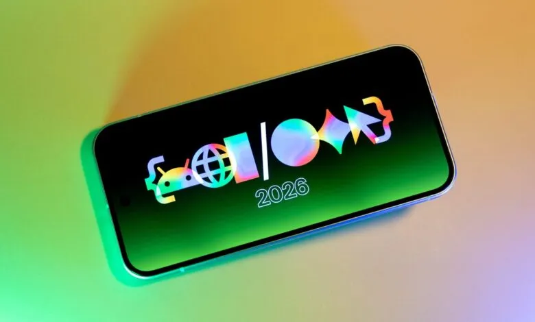 Smartphone displaying a colorful logo and the year 2026 on its screen.