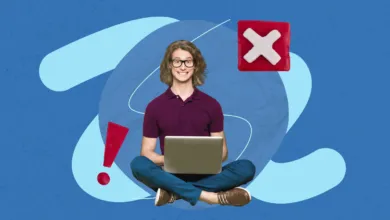 Person with laptop, cross-legged, surrounded by error symbols.