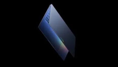 Sleek blue Chromebook laptop against a black background, angled for a modern look.