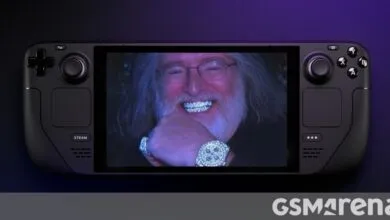 Steam Deck handheld console displaying a man with diamond grillz and jewelry.