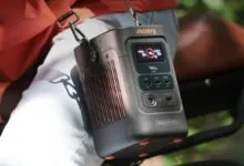 Jackery Explorer 2400 portable power station with shoulder strap.