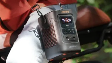 Jackery Explorer 2400 portable power station with shoulder strap.