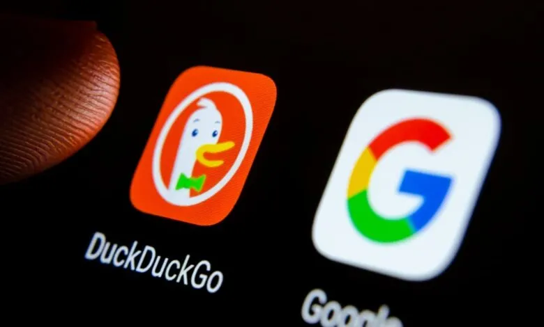 Close-up of DuckDuckGo and Google app icons on a smartphone screen.