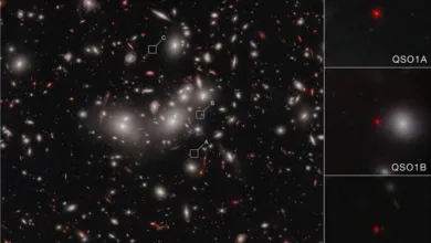 Deep space image showing galaxies and quasars, labeled QSO1A and QSO1B.