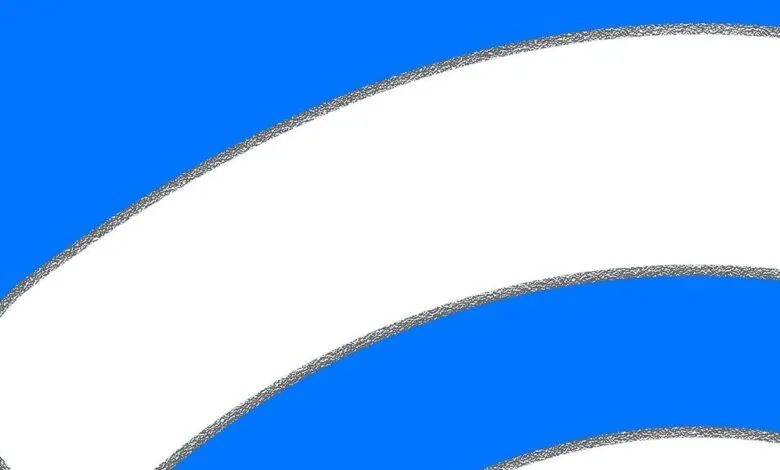 Abstract design with white shapes outlined in gray against a blue background.
