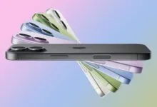 Several iPhones in different colors stacked on top of each other.